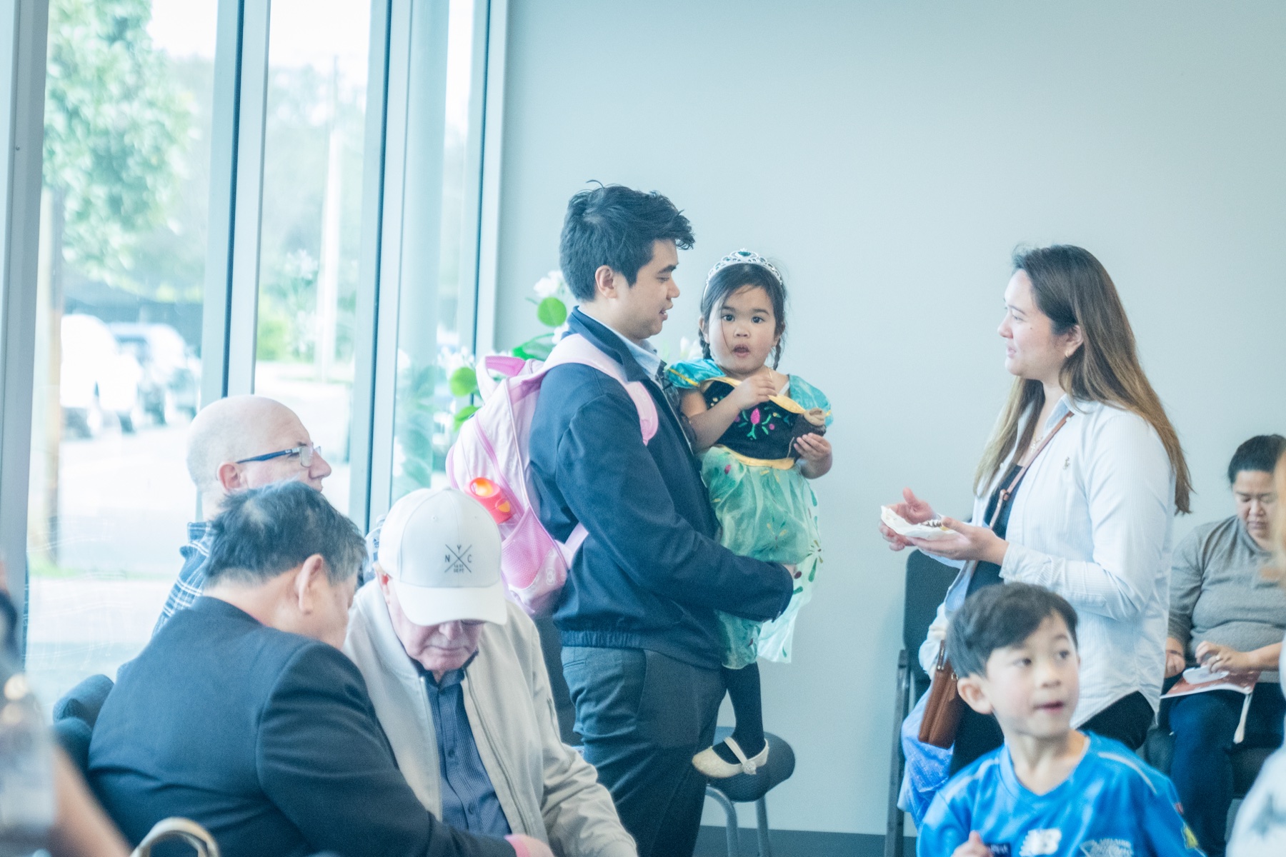 People sharing conversation in the Springpark church foyer